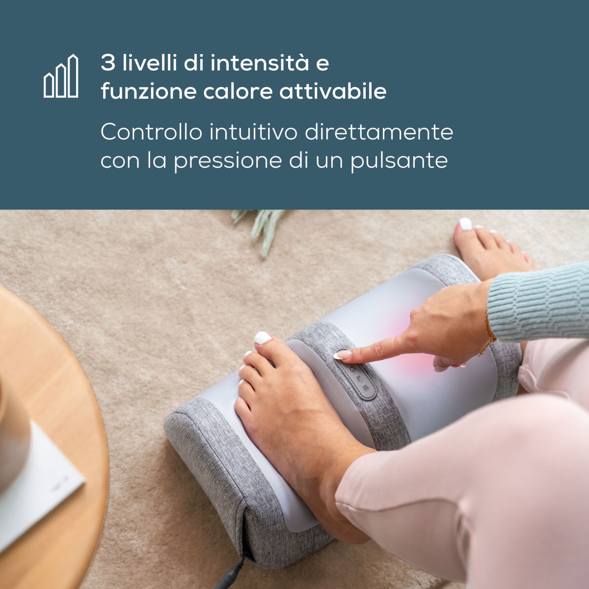 Dito preme il pulsante di Sinneroll, luce calda – 3 livelli di intensità e funzione calore